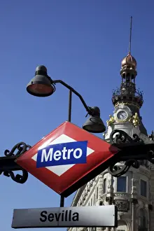 Metro Prints: Sevilla Metro station sign in front of the Banco Espanol de Credito building