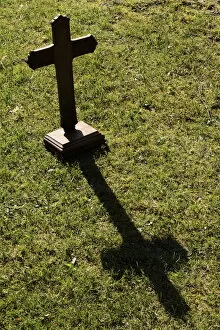 Images Dated 20th April 2011: Shadow of a wooden cross on the lawn, St. Gervais-les-Bains, Haute-Savoie, France, Europe