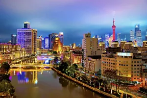Skyscrapers Prints: Shanghai city skyline and Suzhou Creek at night, Shanghai, China