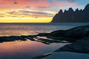 Tungeneset Prints: Sharp mountain peaks under the dramatic sky of midnight sun, Tungeneset viewpoint