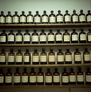 Shelves Prints: Shelves of old essence bottles, Parfumerie Fragonard, Grasse, Alpes Maritimes