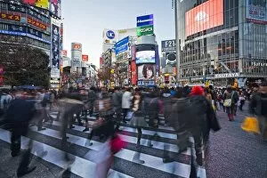 Images Dated 18th December 2010: Shibuya Crossing, crowds of people crossing the intersection in the centre of Shibuya, Tokyo