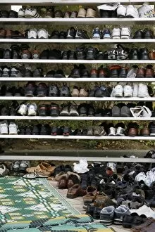 Shoes outside a mosque, Lyon, Rhone Alpes, France, Europe