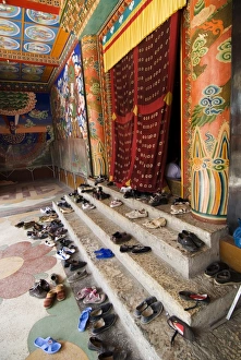 Respect Prints: Shoes outside prayer room, Nanwu temple, Kangding, Sichuan, China, Asia