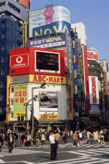 Shinjuku Prints: Shopper on street crossing at Shinjuku-dori Road