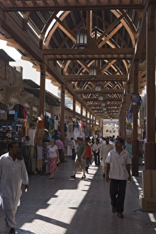 Souks Prints: Shoppers in Bur Dubai souk, Dubai, United Arab Emirates, Middle East