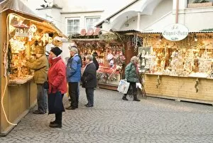 Shoppers at Christmas stalls of Stern Advent Markt market, Salzburg, Austria, Europe
