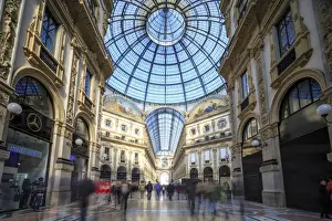 The shopping arcades and the glass dome of the historical Galleria Vittorio Emanuele II