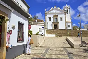 Neo Classical Prints: Shopping with The Neo-Classical Igreja Matriz de Estoi Church in the background, Estoi