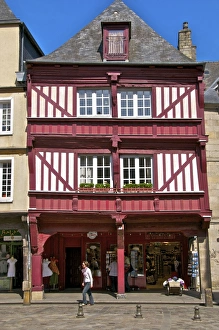 Timbered Prints: Shops and red half timbered house, Cordeliers Square, Dinan, Brittany, France, Europe