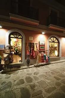 Shops in Skopelos Town at night, Skopelos, Sporades Islands, Greek Islands