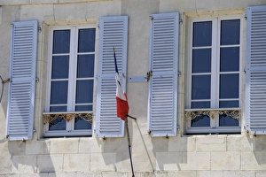 Ile De Re Prints: Shuttered windows and French flag, La Flotte, Ile de Re, Charente-Maritime