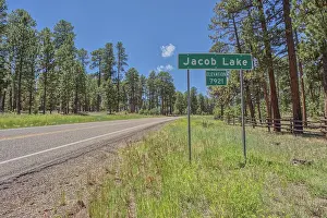 Directions Prints: A sign marking the boundary of Jacob Lake