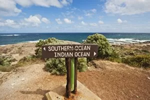 Sign marking the Southern and Indian Oceans at Cape Leeuwin, the south western tip of the continent