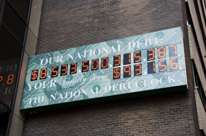 Money Prints: Sign showing the National Debt of the United States