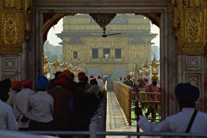 Sikhs at the entrance to the Golden Temple Sikhs at the entrance to the Golden Temple