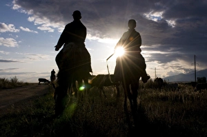 Horse Back Prints: Silhouette of Kyrgyz herders, Karakol, Kyrgyzstan, Central Asia