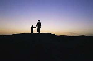 Hope Prints: Silhouette of two people at the archaeological area