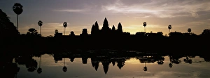 Siem Reap Province Prints: Silhouette of the temple of Angkor Wat reflected in the lake, UNESCO World Heritage Site