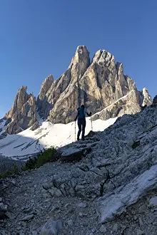 40 To 45 Prints: Silhouette of woman on path with Croda Dei Toni mountain in the background, Val Fiscalina