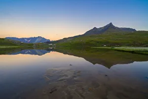 Lago Bianco Prints: Silhouettes of mountains mirrored in Lago Bianco at dawn, Gavia Pass, Valfurva, Valtellina