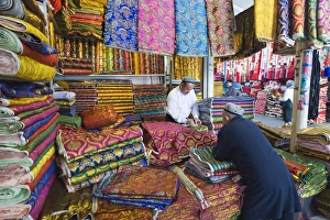 Goods Prints: Silk fabrics being sold at the Sunday market, Kashgar (Kashi), Xinjiang Provice