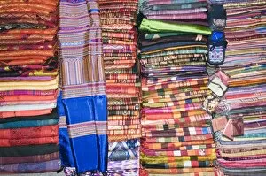 Images Dated 6th January 2008: Silks in night market, Luang Prabang, Laos, Indochina, Southeast Asia, Asia