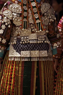 Tribal Prints: Detail of silver ornaments on festival dress of a Miao woman, Langde, Guizhou province