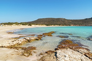 Beachgoers Prints: Simos beach with turquoise water, Elafonisos island, Greece