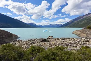 A single iceberg floating near the shore in Lago Argentino near Perito Moreno Glacier