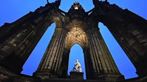 Tall Prints: Sir Walter Scott Memorial stands tall against twilight sky in Edinburgh