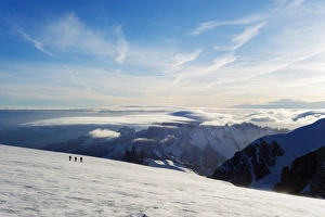 Rhone Alpes Prints: Ski tourer on Mont Blanc and Mont Blanc du Tacul, 4248m, behind, Chamonix, Rhone Alpes