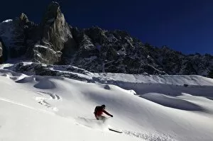 Images Dated 18th January 2010: A skier enjoying perfect powder snow on the celebrated Pas de Chevre off-piste run