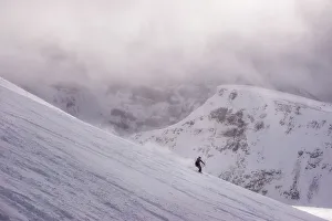 Skier in the mountains on a magical looking day, Canada, North America