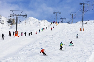 Skiing Prints: Skiers on a drag lift, Veysonnaz (Verbier), 4 Vallees, Valais, Swiss Alps, Switzerland