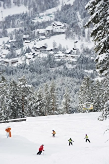 Skiers on piste above Seefeld village, Seefeld, the Tyrol, Austria, Europe