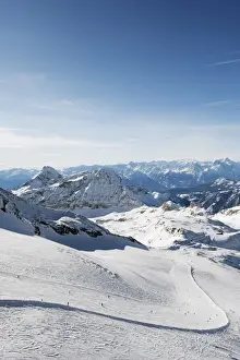 Alps Prints: Skiers skiing on a ski run, mountain scenery in Cervinia ski resort, Cervinia