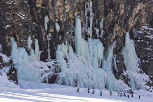 Skiers underneath the frozen waterfall, Hidden Valley ski area, Lagazuoi, Armentarola 101
