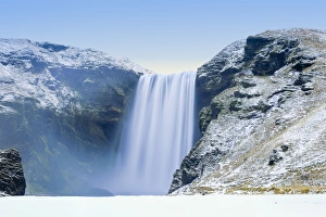 Power In Nature Prints: Skogafoss Waterfall in snow, Iceland, Polar Regions