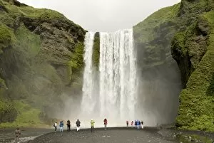 Images Dated 6th August 2010: Skogarfoss, the powerful curtain waterfall drops 60 m over a cliff of basalt lavas