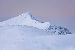 Troms Og Finnmark Prints: Skredfloget mountain peak at dusk in winter