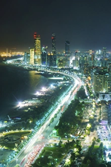 Persian Gulf Prints: Skyline and Corniche, Al Markaziyah district by night, Abu Dhabi, United Arab Emirates