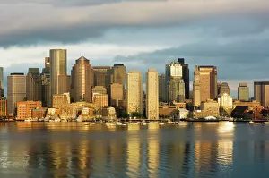 Images Dated 28th February 2008: The skyline of the Financial District across Boston Harbor at dawn