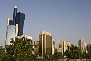 Skyline of modern buildings on the Corniche (waterfront) at Abu Dhabi, United Arab Emirates
