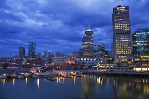 Canada Place Prints: Skyline and the waterfront in the evening from Canada Place with the Seabus Terminal