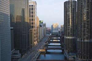 Skyscrapers along the Chicago River and West Wacker Drive at dawn, Marina City on the right Skyscrapers along the Chicago River and West Wacker Drive at dawn, Marina City on the right