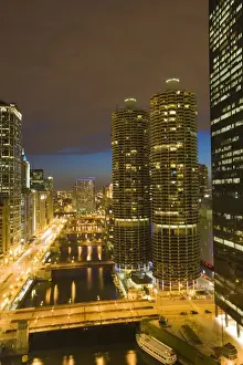 Congestion Prints: Skyscrapers lining the Chicago River and West Wacker Drive at dusk