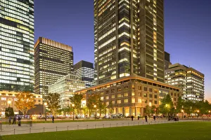 Traditionally Japanese Prints: Skyscrapers of Marunouchi at dusk, Tokyo, Honshu, Japan, Asia