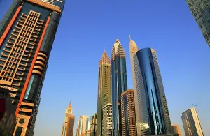 Tall Prints: Skyscrapers reach towards the blue sky in central Dubai