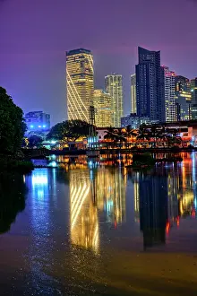 Stillness Prints: Skyscrapers reflecting in Beira Lake at sunset, Colombo, Sri Lanka